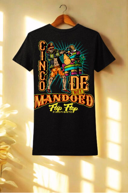 Black t-shirt with colorful graphic design on a wooden hanger against a light background