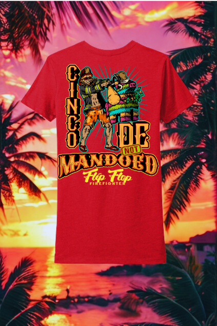 Red t-shirt with graphic design and text against a tropical sunset background