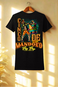 Black t-shirt with colorful graphic design on a wooden hanger against a light background