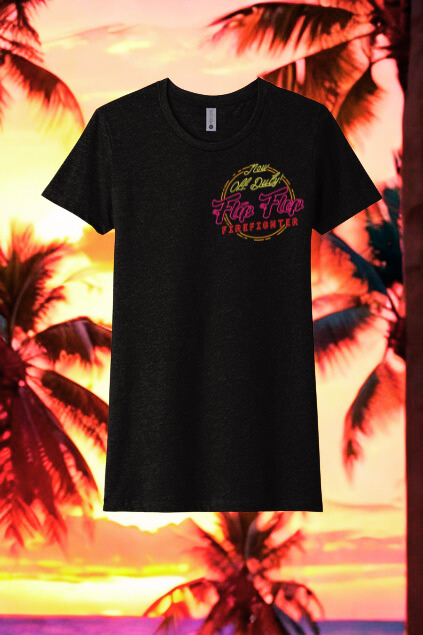 Black t-shirt with colorful graphic design on a palm tree and sunset background