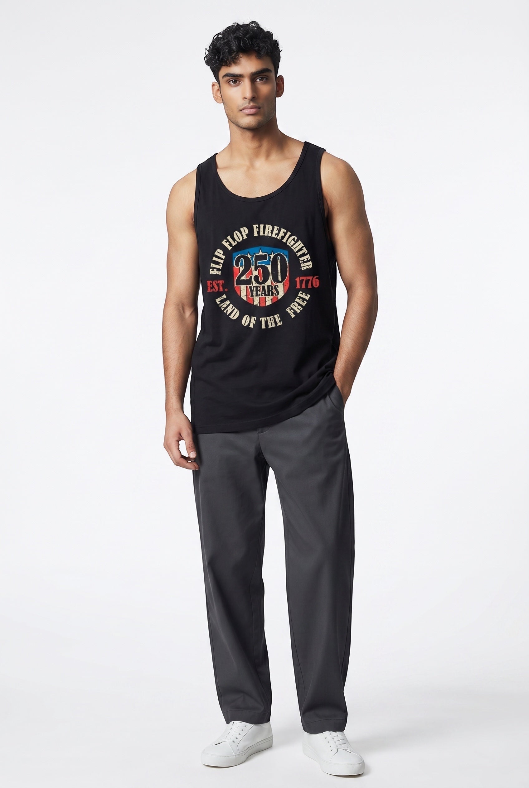 Flip Flop Firefighter black tank top with America 250 graphic print worn by a man with dark trousers and white shoes