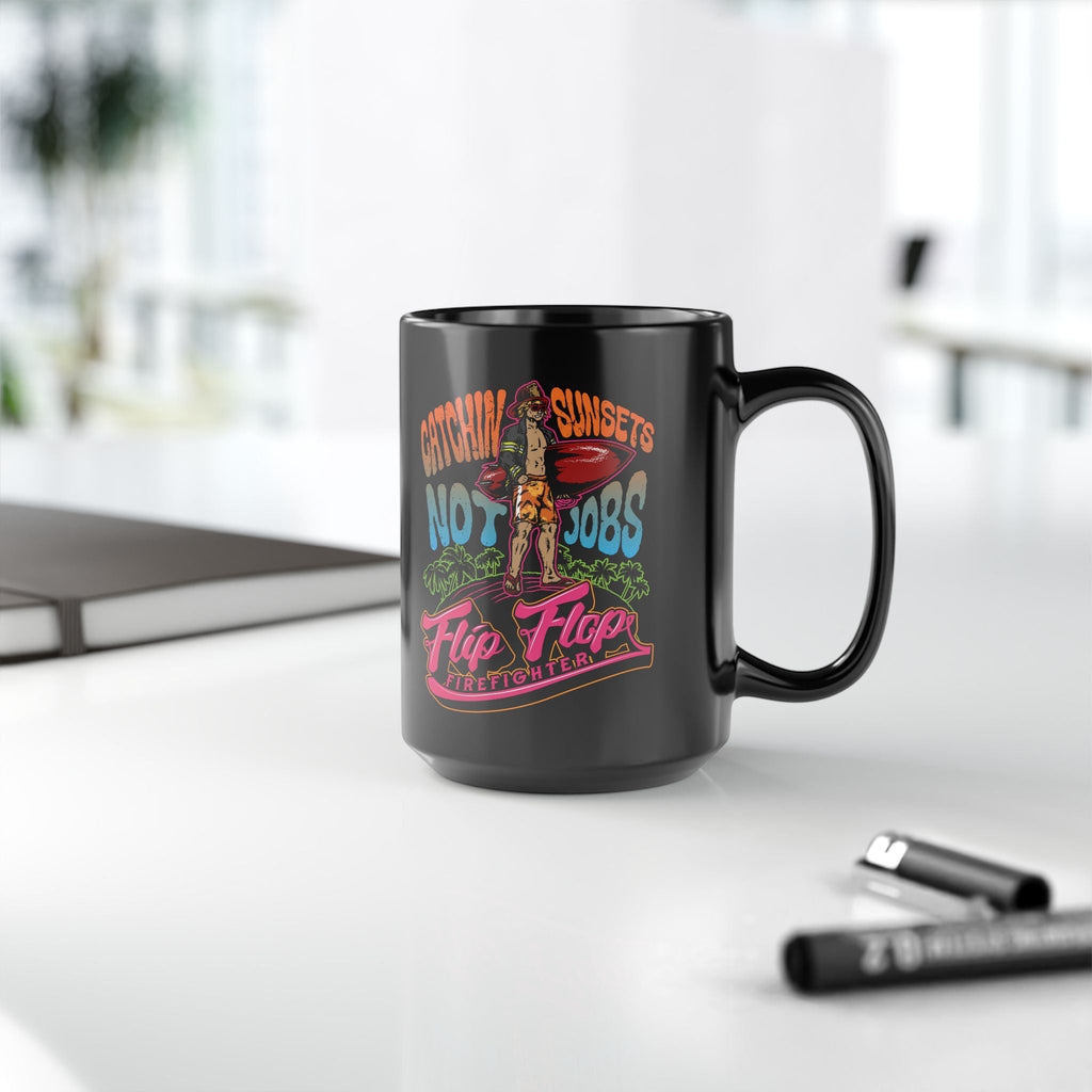 Flip Flop Firefighter black ceramic coffee mug featuring a Catchin' Sunsets graphic with a surfer and surfboard.