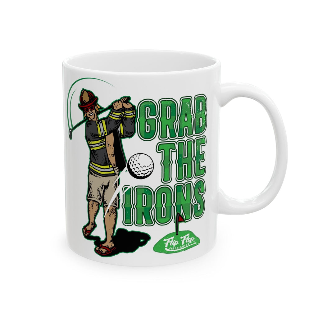 Flip Flop Firefighter white ceramic coffee mug featuring a firefighter golfing graphic with Grab The Irons text