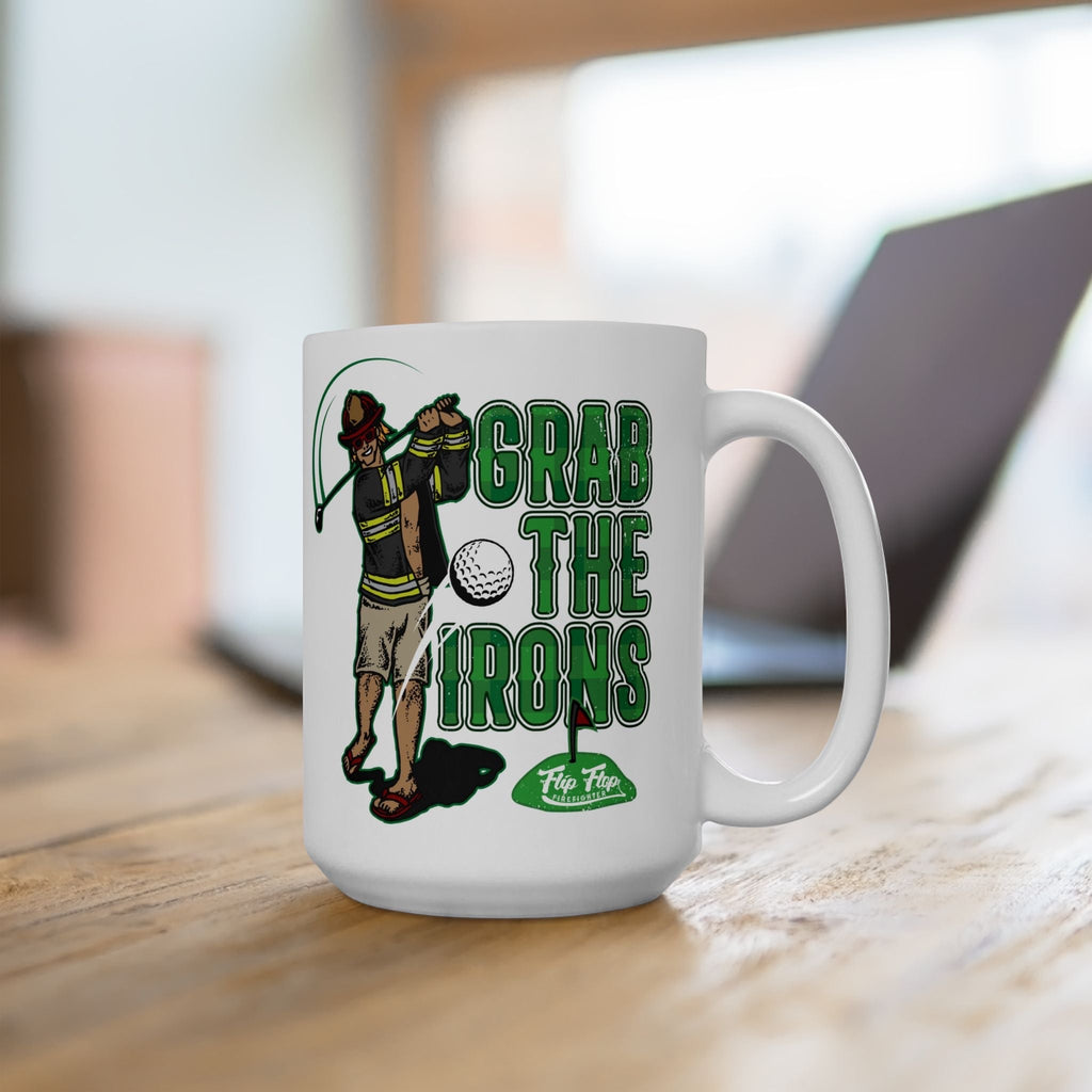 Flip Flop Firefighter white ceramic coffee mug featuring a firefighter golfing graphic with Grab The Irons text.