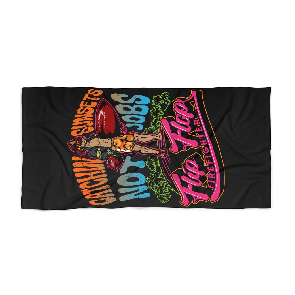 Flip Flop Firefighter beach towel with black background and vibrant orange, blue, and pink graphic surf design.