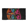 Flip Flop Firefighter beach towel with black background and vibrant orange, blue, and pink graphic surf design.