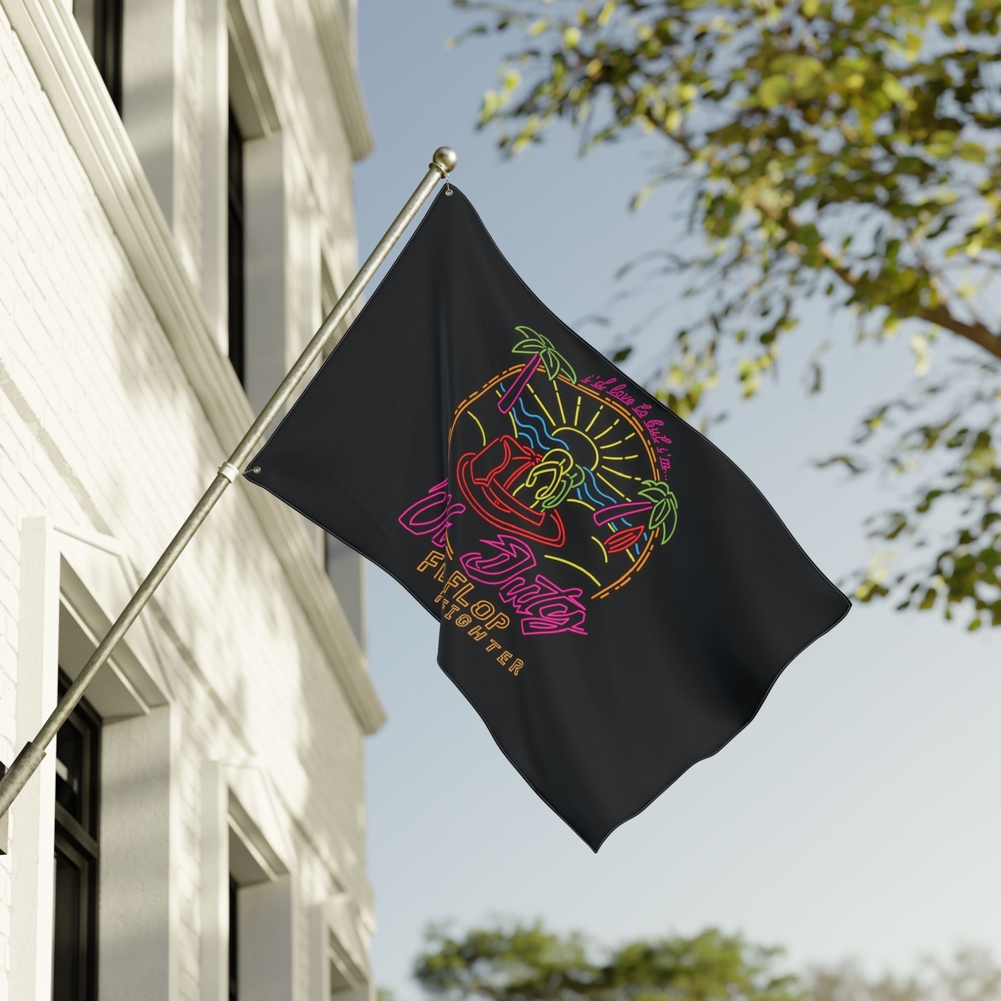 Flip Flop Firefighter Off Duty polyester flag with neon-style tropical beach graphic hanging on a building exterior