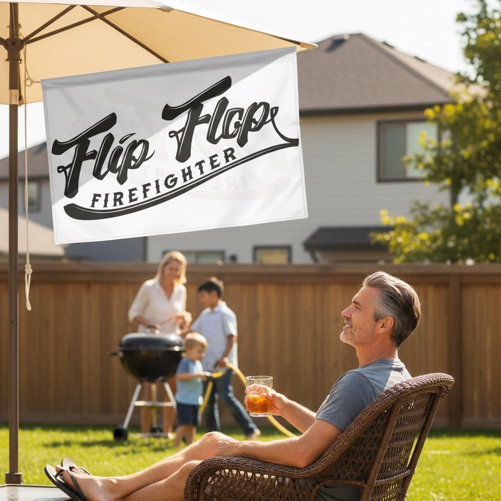 Flip Flop Firefighter OG Flag hanging under a patio umbrella with a man relaxing in a chair in a sunny backyard