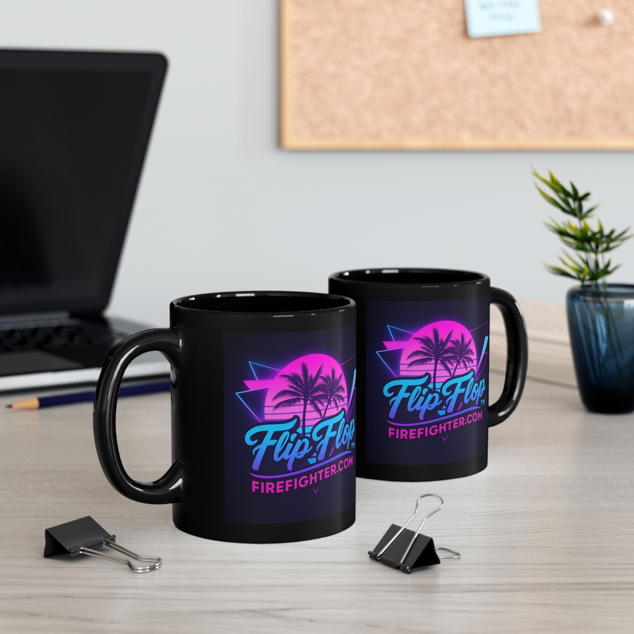 Flip Flop Firefighter black ceramic coffee mugs with vibrant neon retro palm tree print on a desk.
